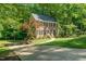 Well-maintained home with a brick facade and a long driveway at 1104 Berwyn Way, Raleigh, NC 27615