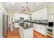 Stylish kitchen with stainless steel appliances and granite countertops at 1104 Berwyn Way, Raleigh, NC 27615