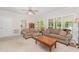 Comfortable living room with large windows and traditional furnishings at 1104 Berwyn Way, Raleigh, NC 27615
