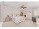 Spacious main bedroom features a ceiling fan and soft, neutral decor at 1104 Berwyn Way, Raleigh, NC 27615