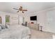 Comfortable main bedroom with neutral tones and a ceiling fan at 1104 Berwyn Way, Raleigh, NC 27615