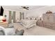 Large main bedroom with soft decor and a ceiling fan at 1104 Berwyn Way, Raleigh, NC 27615