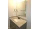 Bathroom vanity with granite countertops, black fixtures, and a framed mirror at 119 Oak Ridge Rd, Franklinton, NC 27525