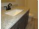 Bathroom featuring new granite countertops, modern fixtures, and hard surface floors at 119 Oak Ridge Rd, Franklinton, NC 27525