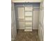 Spacious walk-in closet with built-in shelving offers ample storage and organization at 119 Oak Ridge Rd, Franklinton, NC 27525