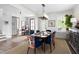 Elegant dining room with stylish chairs, a round table, and natural light at 1205 Quincy Cottage Rd, Hillsborough, NC 27278