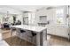 Spacious kitchen with large island, stainless steel appliances, and open layout at 1205 Quincy Cottage Rd, Hillsborough, NC 27278
