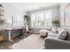 Comfortable home office featuring a large window, desk, and seating area at 1205 Quincy Cottage Rd, Hillsborough, NC 27278