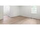 Bright bedroom with ample sunlight and closet at 1209 Maple Ave, Apex, NC 27502