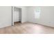 Bright bedroom with ample sunlight and closet at 1209 Maple Ave, Apex, NC 27502