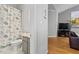 A cozy half bathroom with marine-themed shower curtain and decorative accents at 123 Chimney Rise Dr, Cary, NC 27511