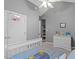 Bedroom showcasing vaulted ceilings, a white bed frame and closet at 123 Chimney Rise Dr, Cary, NC 27511