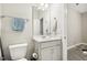 Cozy bathroom featuring a white sink, toilet, and towel rack at 127 Manordale Dr, Chapel Hill, NC 27517