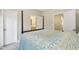 Bedroom featuring a four poster bed and entrances to additional rooms at 127 Manordale Dr, Chapel Hill, NC 27517