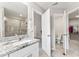 Bright bathroom featuring granite countertops, modern fixtures, and a spa-like ambiance at 1310 Compass Dr, Durham, NC 27713