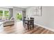 Bright dining area with access to the backyard, perfect for indoor-outdoor living at 1310 Compass Dr, Durham, NC 27713