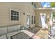 Back deck featuring comfortable seating area, direct access to house, and serene outdoor space for relaxing at 137 Lanigan Pl, Cary, NC 27513