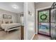Charming hallway view showing front door and access to the main bedroom at 137 Lanigan Pl, Cary, NC 27513