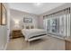 Well-lit main bedroom with carpet, natural light, and neutral tones for a peaceful retreat at 137 Lanigan Pl, Cary, NC 27513