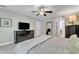 Comfortable bedroom with dresser and a flat screen television at 137 Lanigan Pl, Cary, NC 27513