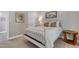 Cozy main bedroom with inviting queen bed, bedside table, and soft lighting for a comfortable atmosphere at 137 Lanigan Pl, Cary, NC 27513