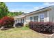 Landscaped backyard features a patio and lush greenery at 1405 Ventnor Pl, Cary, NC 27519