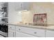Kitchen with stainless steel oven and cooktop at 1405 Ventnor Pl, Cary, NC 27519