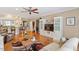 Open concept living room with access to kitchen and dining area at 1405 Ventnor Pl, Cary, NC 27519