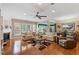 Spacious living room with hardwood floors, fireplace, and comfortable seating at 1405 Ventnor Pl, Cary, NC 27519