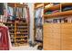 Organized walk-in closet with custom shelves, drawers, and lots of storage at 1405 Ventnor Pl, Cary, NC 27519