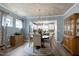 Open dining area featuring a decorative chandelier and seamless access to the kitchen at 1520 Palmer Hill Dr, Durham, NC 27703