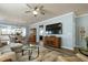 Living room with a view of the dining area, hardwood floors, and modern decor at 1520 Palmer Hill Dr, Durham, NC 27703