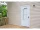 Back porch and door with vinyl siding at 1536 Granville Street, Burlington, NC 27215