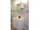 Bathroom featuring a vanity sink with drawers, mirrored cabinet, black towel rack, and curtain at 1536 Granville Street, Burlington, NC 27215