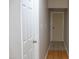 Hallway with doors and wood flooring at 1536 Granville Street, Burlington, NC 27215