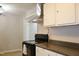 The kitchen shows stainless steel appliances, white cabinets, and countertop space at 1536 Granville Street, Burlington, NC 27215