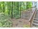 Backyard with patio and stairs at 1702 Falls Church Rd, Raleigh, NC 27609