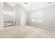 Bright Primary bedroom boasts vaulted ceilings, large window, and an ensuite bath at 1724 Briarforest Pl, Raleigh, NC 27615