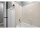 A cozy bathroom features a bathtub with shower and classic tile at 173 Clancy Cir, Cary, NC 27511