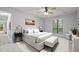 A staged bedroom showcases natural light and ample space at 173 Clancy Cir, Cary, NC 27511
