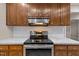 A close-up of the stainless steel stovetop in the renovated kitchen at 173 Clancy Cir, Cary, NC 27511