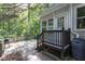 View of the spacious back deck and door entrance, perfect for relaxing outdoors and grilling with Gathering and friends at 175 Fox Run Rd, Youngsville, NC 27596