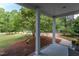 Covered front porch with classic columns, offering a relaxing outdoor space at 175 Fox Run Rd, Youngsville, NC 27596