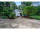 Large front yard view with a long driveway and view of the front of the house at 175 Fox Run Rd, Youngsville, NC 27596