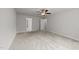Spacious bedroom features plush carpeting, ceiling fan, and neutral paint, creating a comfortable and inviting space at 188 Karlov Rd, Garner, NC 27529