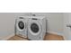 The laundry room features a modern washer and dryer set for efficient laundry care at 188 Karlov Rd, Garner, NC 27529