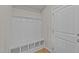 Mudroom with built-in bench, storage cubbies, and coat hooks at 188 Karlov Rd, Garner, NC 27529