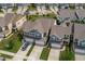 Beautiful aerial view of townhomes featuring a well-maintained community and landscaping at 210 Mayfield Dr, Apex, NC 27539