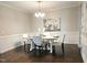 Bright dining room featuring modern lighting, stylish decor, and hardwood floors at 210 Mayfield Dr, Apex, NC 27539