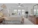 Inviting main bedroom with sitting area, plush carpet, and neutral decor at 210 Mayfield Dr, Apex, NC 27539